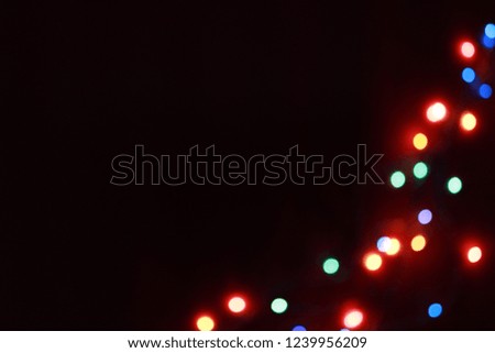 Abstract bokeh background of round Christmaslight and celebrations.
