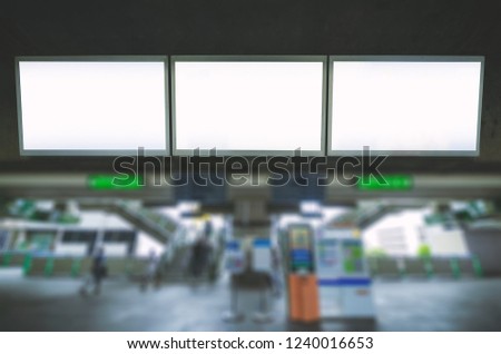 advertising billboard big blank white three LED screen horizontal outstanding over side way people walking on sky train for display advertisement text template promotion new brand outdoor.