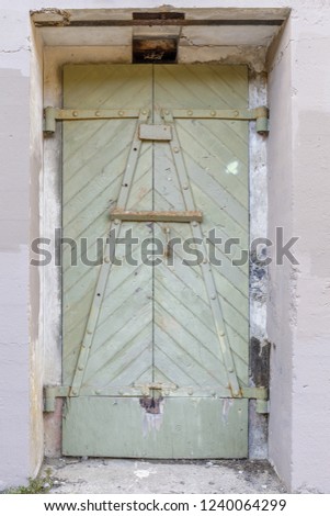 Ruins of a metal door at Battery West. Presidio of San Francisco, California, USA.