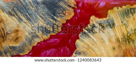Epoxy resin stabilizing Afzelia burl exotic wood red background texture, Abstract art picture photo, print design and your advertisement