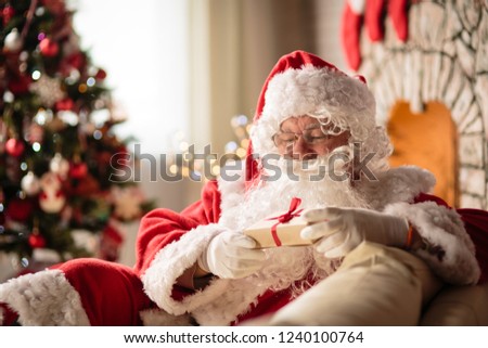 Santa Claus in a room on Christmas Eve