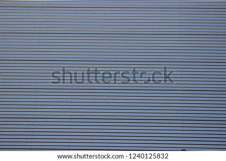 Metall striped grey wall background.