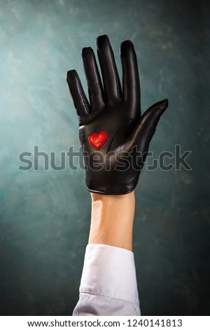 Female hand in a beautiful leather glove