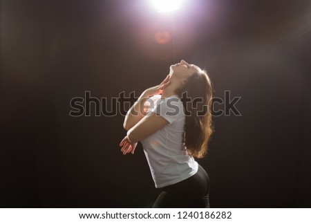People and street dancing concept - Young fitness woman dancing jazz funk in dance class