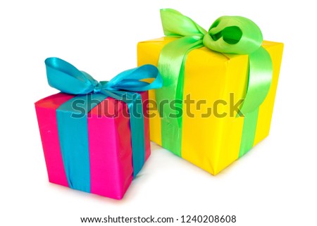 Gift boxes with ribbon and bow on white background