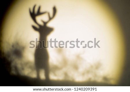 soft silhouette of deer with antler for christmas greeting card - background