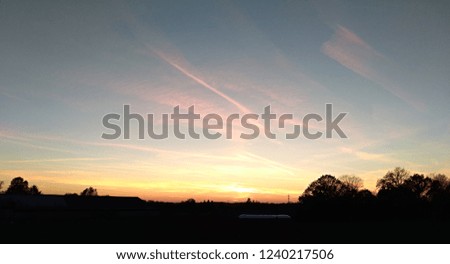 sunset over cowshed in Vestec, Bestvina, Czech Republic