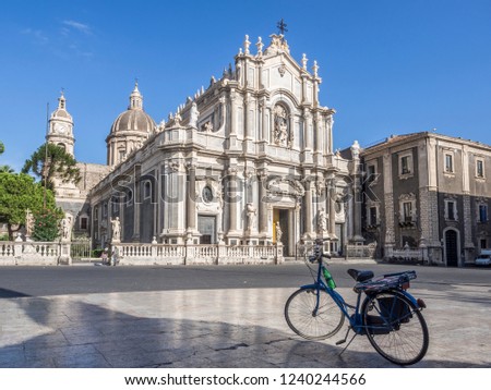 The Piazza del Duomo in Catania city centre with majestic cathedral of St. Agatha with bicycle in the front, Catania, Sicily, Italy Royalty-Free Stock Photo #1240244566