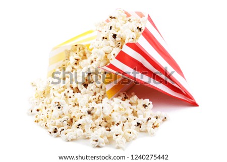 Popcorn in paper bags isolated on white background