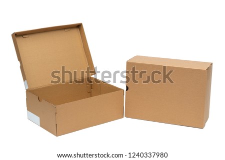Brown cardboard shoes box with lid for shoe or sneaker product packaging mockup, isolated on white background with clipping path. Royalty-Free Stock Photo #1240337980