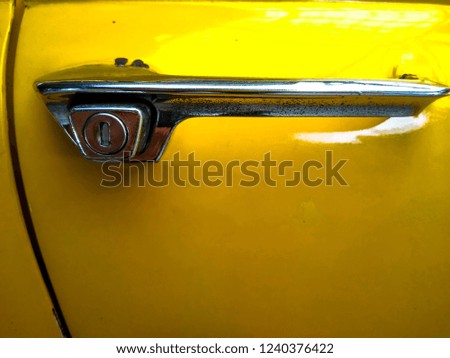 Classic Yellow Car Door.,soft focus.