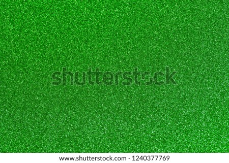 Color seafoam green shiny glitter Christmas texture background.
Gradient blue green light silver sparkle backdrop. 
