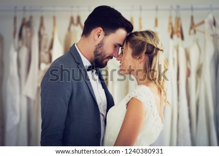 Beautiful model wedding couple in studio shop picture vintage style tone
