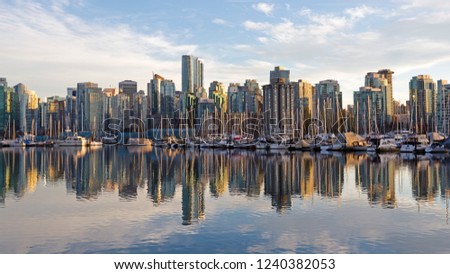 View of Vancouver, British Columbia skyline from the harbor at sunset
