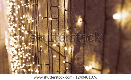 lighting decoration along the wall for christmas and new year celebration with bokeh