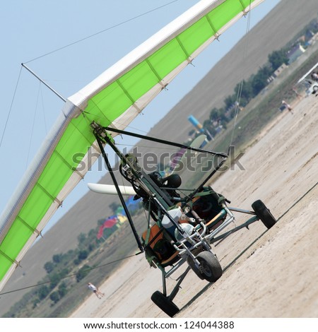 Motor hang glider close up on the ground