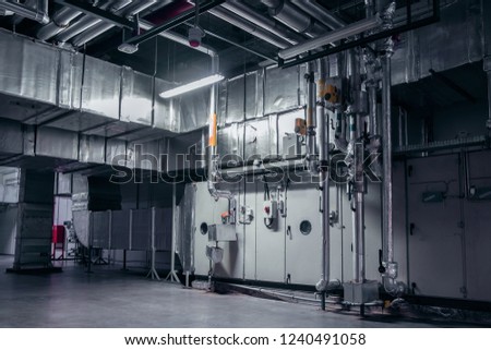 Modern industrial interior of the ventilation plant room, that can be used for environmental 3d modelling. Royalty-Free Stock Photo #1240491058