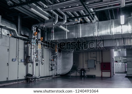 Modern industrial interior of the ventilation plant room, that can be used for environmental 3d modelling. Royalty-Free Stock Photo #1240491064