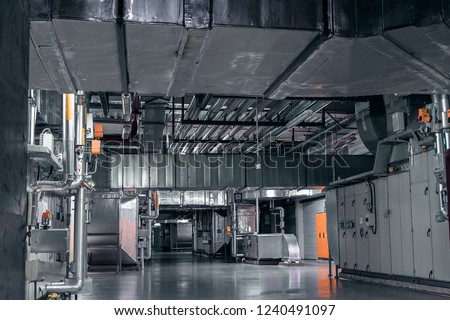 Modern industrial interior of the ventilation plant room, that can be used for environmental 3d modelling. Royalty-Free Stock Photo #1240491097