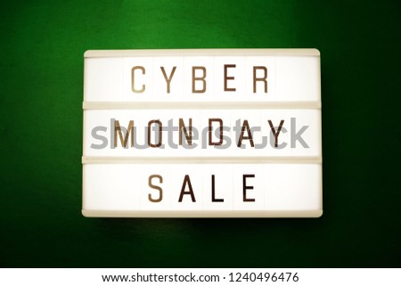 cyber monday sale flat lay top view on green background