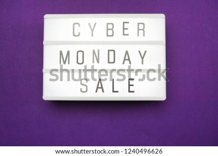 cyber monday sale flat lay top view on purple background