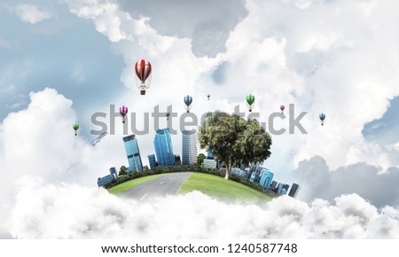 Green flying island with urban view of towers and skyscrapers. Flying aerostates and blue cloudy skyscape on background. 3D rendering.