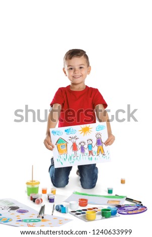 Cute child showing his painting on white background