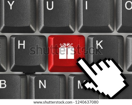 Computer keyboard with gift key - business background