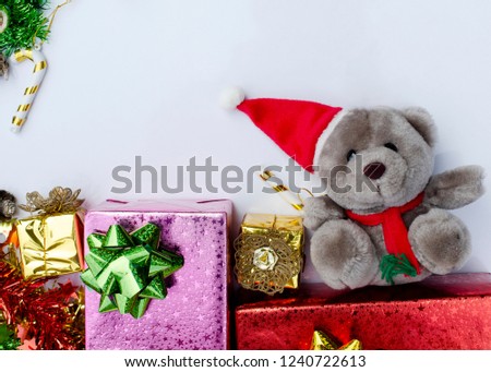 Christmas backgrounds with teddy and gift box on white backgrounds