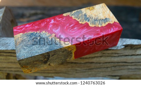 epoxy resin Stabilizing Afzelia burl exotic wood red background, Abstract art picture photo, print design and your advertisement