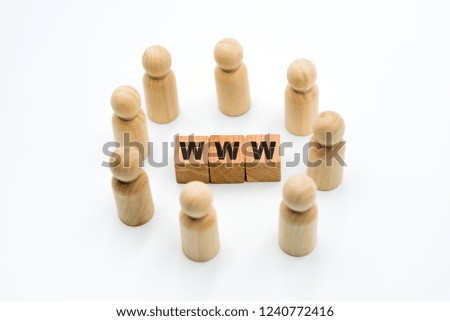 Wooden figures as business team in circle around acronym WWW World Wide Web, isolated on white background, minimalist concept