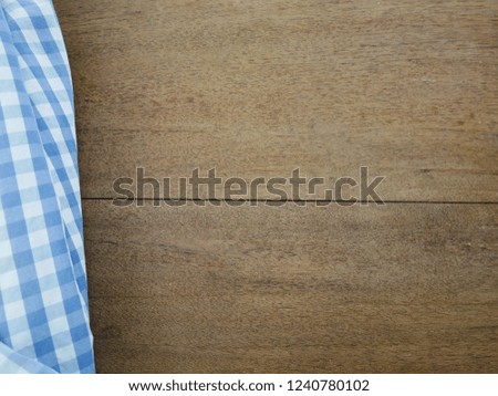 Wooden table Square pattern fabric background. Wood and Scott chintz fabric for design.wood background
