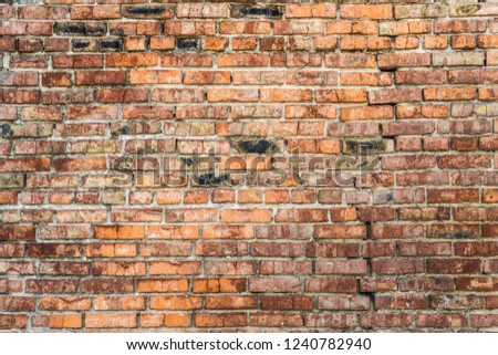 Old red brick wall.  Close-up picture of bricks.