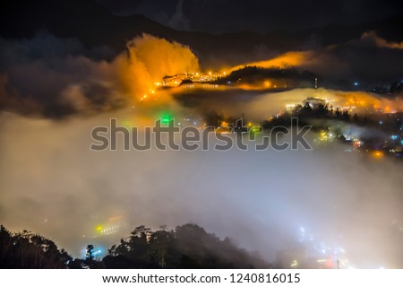 The fog moving pass the village on the hill in Vietnam