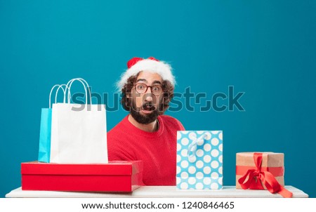 young man with gifts. christmas concept