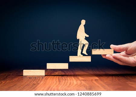Coach motivate to personal development, success and career growth concept. Version with bigger wooden person. Royalty-Free Stock Photo #1240885699