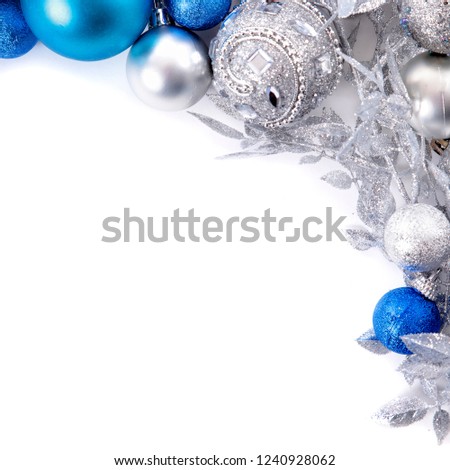 Christmas border with blue and silver decorations square