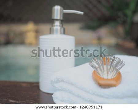 hair comb and towel on the room