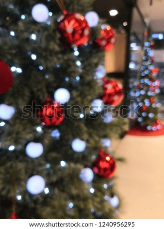 Blured picture : christmas tree in department store