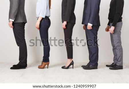 Unrecognizable business people profile in office. Professional team posing for photo, subordination concept, crop