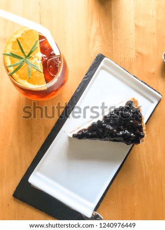 Blueberry cheesecake and orange coffee