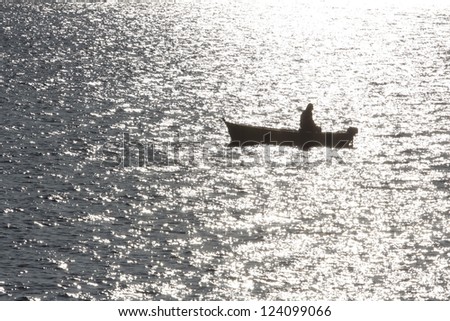lonely man in the boat