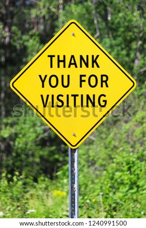 Closeup of a thank you for visiting sign