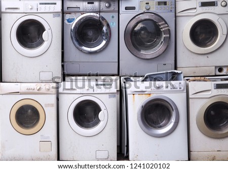 Electronics Washing machine waste old, used and obsolete electronic equipment for  recycle in factory industry.
 Royalty-Free Stock Photo #1241020102