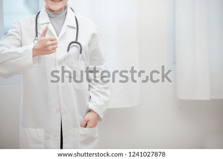 Doctor Asian woman, medical professional gesture up confidence Let the patient .