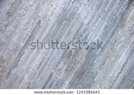The texture of the rough surface of the marble slab