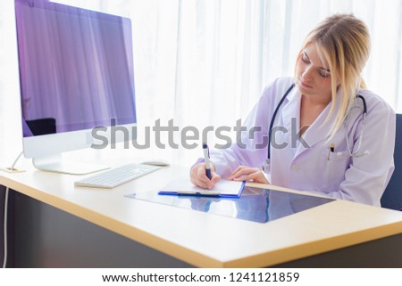 Hands of medical doctor holding pen writing on clipboard closeup. Medical care