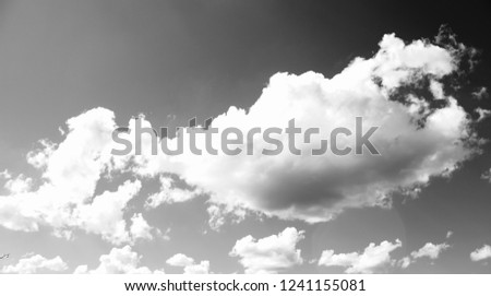 The sky in the clouds. Black and white photo.