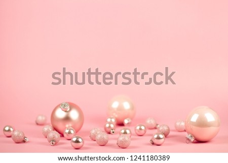 Fashion christmas decoration on pink background. Closeup of pink christmas . Trendy minimal concep. pastel color
