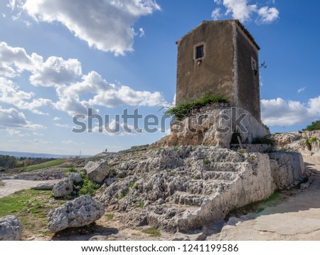 The open air theatre in Parco Archeologico Neapolis in Syracuse city, Sicily, Italy Royalty-Free Stock Photo #1241199586